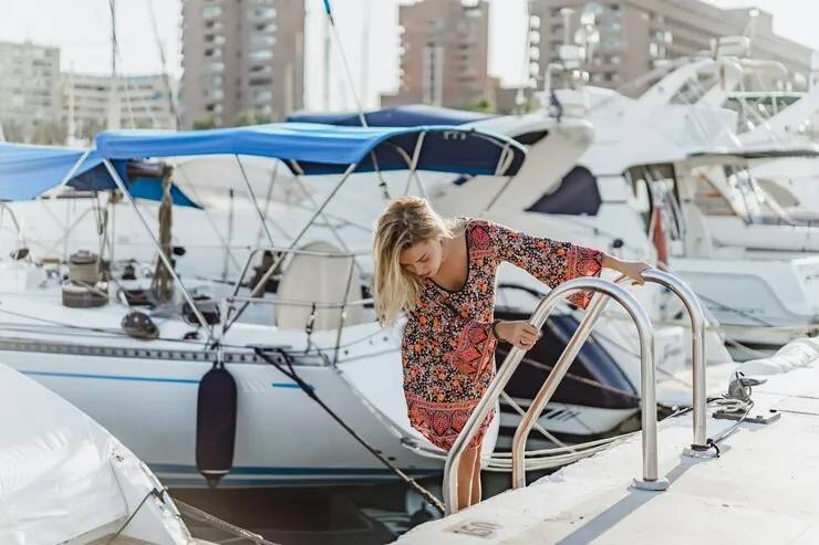 Woman near the yacht