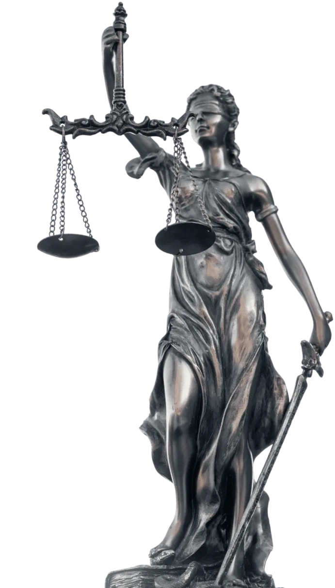 Statue of Lady Justice holding a set of scales in one hand and a sword in the other, with eyes covered by a blindfold.